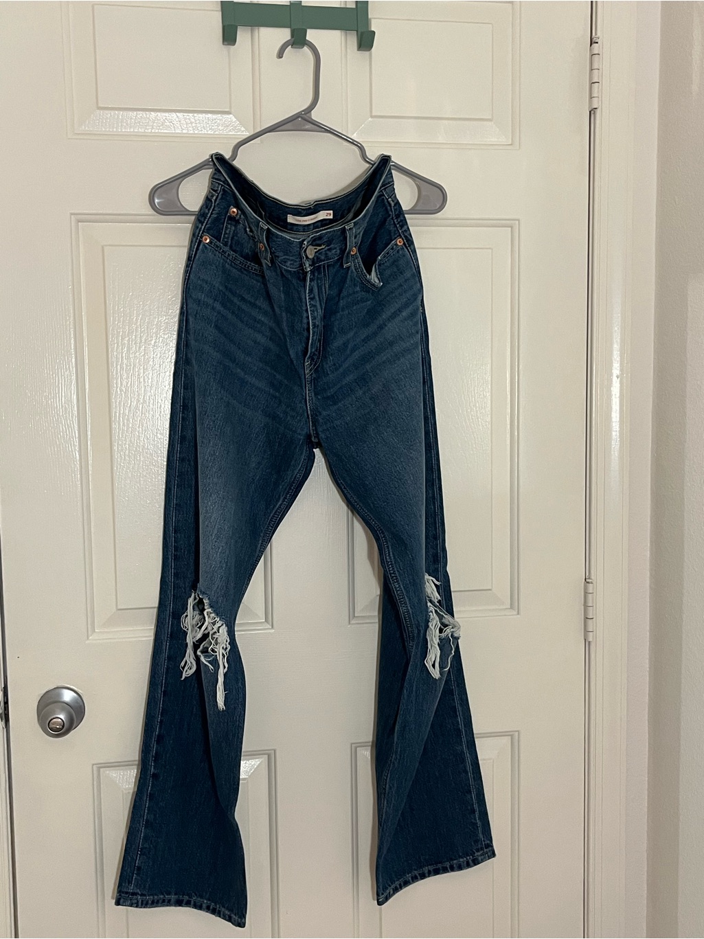 Levi's Dark Blue High-Rise Flare Jeans With Distressed Knees